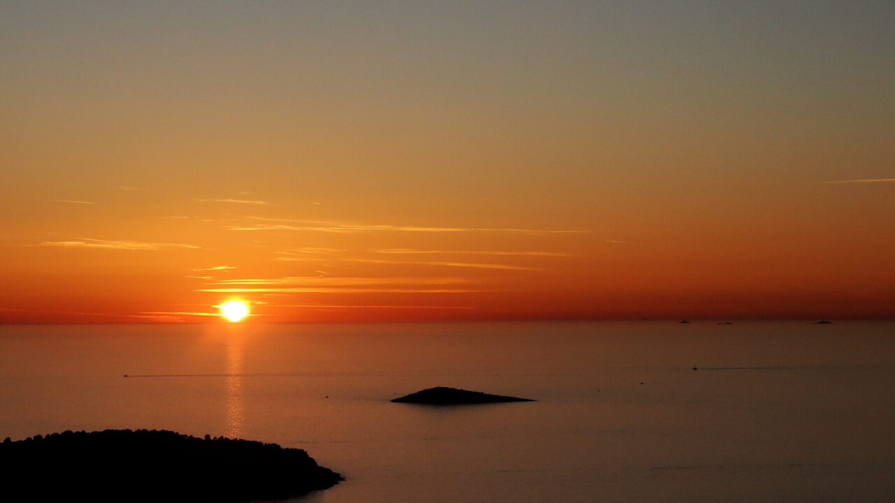 Sunset at Lady of Loreto, Primošten, Croatia by Keith Wilson