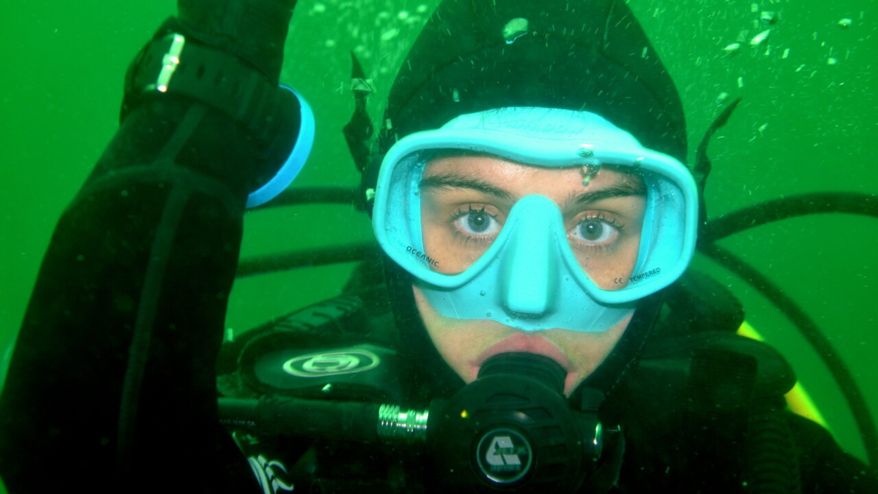 Ella diving in Skye by Keith Wilson
